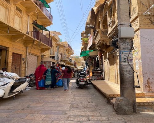 People walking in an urban Indian street setting